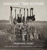 Product Description: **LIMITED AVAILABILITY**</br></br>Each book is signed by Freeman Vines andcomes with a copy of the Hanging Tree Guitars musical accompaniment. The album features 12 songs from deep within Music Maker's catalog and recent recordings of Freeman Vines' family members.</br></br>To meet Freeman Vines is to meet America itself. An artist, a luthier and a spiritual philosopher, Vines’ life is a roadmap of the truths and contradictions of the American South. He remembers the hidden histories of the eastern North Carolina land on which his family has lived since enslavement. For over 50 years Vines has transformed materials culled from a forgotten landscape in his relentless pursuit of building a guitar capable of producing a singular tone that has haunted his dreams. From tobacco barns, mule troughs, and radio parts he has created hand-carved guitars, each instrument seasoned down to the grain by the echoes of its past life. In 2015 Vines befriends photographer Timothy Duffy and the two begin to document the guitars, setting off a mutual outpouring of the creative spirit. But when Vines acquires a mysterious stack of wood from the site of a lynching, Vines and Duffy find themselves each grappling with the spiritual unrest and the psychic toll of racial violence living in the very grain of America.</br></br>Published by the Bitter Southerner in association with Music Maker Relief Foundation</br></br>8 x 8 1/2 in..</br></br>159 pages,</br></br>80 duotone images</br></br>Paperback with flaps</br></br>978-0-578-62403-7</br></br>September 1st, 2020</br></br>Hanging Tree Guitars is a haunting book that blends the eloquent voice of Freeman Vines with photographs of his guitars - some carved from a tree where a black man was lynched. The book is a grim reminder that race defines both Freeman Vines’ life and our own. Tim Duffy’s photographs bring a dreamlike quality to the book and underscore its timeless power.”— Dr. William R. Ferris (Grammy award winner & former chairman of the National Endowment for the Humanities</br></br>A fabulous book - just profoundly beautiful, filled with extraordinary materials, and terrific photographs. - Carrie Mae Weems</br></br>A heartfelt and beautifully-realized book. Freeman now has a legacy that extends longer, further and so elegantly. - Sally Mann</br> Hanging Tree Guitars Book (signed) & CD