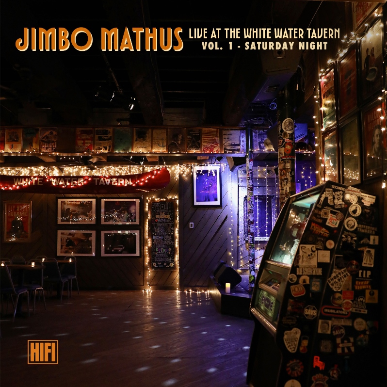 Product Description: An arsonist tried to burn down Little Rock’s most famous dive bar twice in the 1980s. One listen to Live at White Water Tavern, Vol. 1 will convince you that Jimbo Mathus finished the job a few decades later. He’s backed here by The Creatures of the Southern Wild, his road-seasoned band, playing music as raucous and righteous as the room where it was recorded.</br></br> Mixing old favorites (“Skateland Baby”) with one newer song (“Go Out to LA”), Mathus demonstrates why he has earned a reputation as an animated hell-raiser with roots that spiral deep into the soil of Mississippi, his home state. Live at White Water Tavern, Vol. 1 rarely lets up, from the prison-shank menace of “Blues So Bad” to the album closer, “Alligator Fish,” an electrifying Jerry Lee Lewis-meets-Captain Beefheart jumble.</br></br> The album’s comparatively mellow numbers – the Joe Ely-flavored “South of Loredo” and the wistful, Stones-y “Skateland Baby” – substitute heartache for havoc. The Creatures of the Southern Wild follow their leader through every hairpin turn, matching him in mood and intensity. They lit up the night sky in Little Rock, and the fire burns on in these grooves.</br> Jimbo Mathus Live at White Water Tavern Vol. I